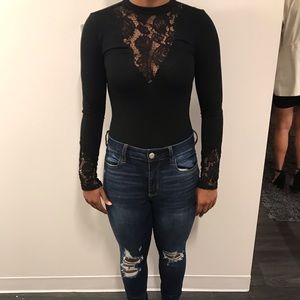 Black long sleeve body suit